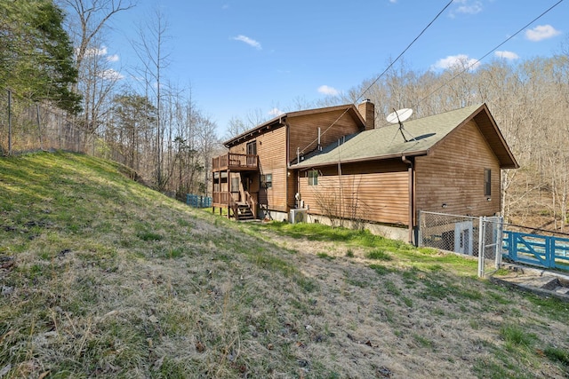 3755 Bear Hollow Rd, Joelton, TN 37080 - exterior space with a lawn, a chimney, a gate, and fence