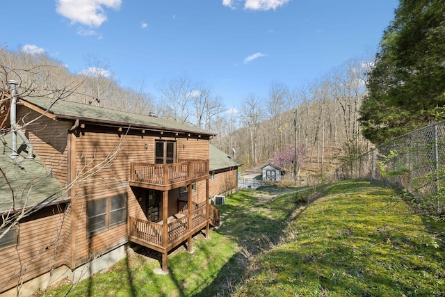 3755 Bear Hollow Rd, Joelton, TN 37080 - rear view of house featuring a balcony, cooling unit, and a yard