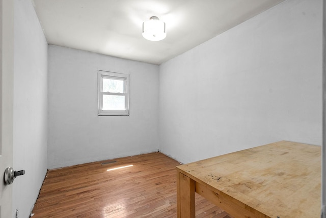 spare room with visible vents and light wood finished floors