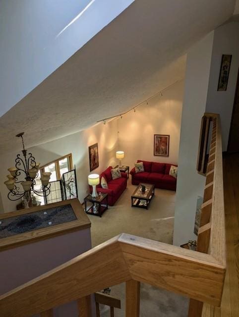 living area with an inviting chandelier