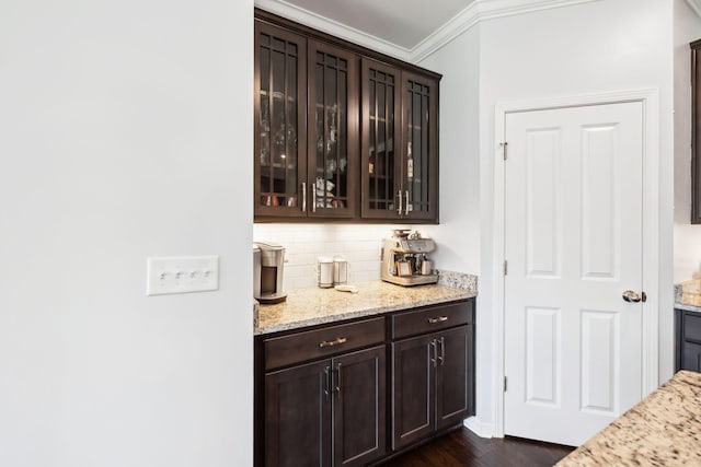 7403 Hemen Way, Fairview, TN 37062 - bar featuring dark wood-style floors, decorative backsplash, and ornamental molding