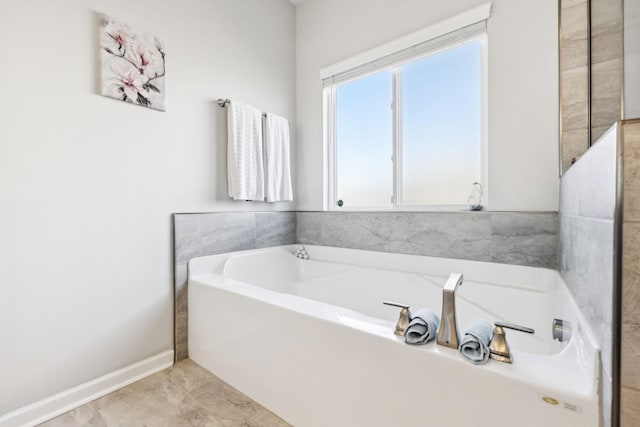 7403 Hemen Way, Fairview, TN 37062 - bathroom featuring baseboards and a garden tub