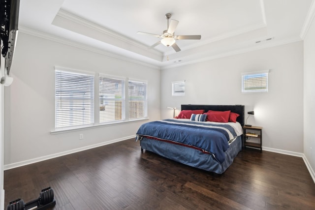 7403 Hemen Way, Fairview, TN 37062 - bedroom with wood-type flooring, a tray ceiling, baseboards, and visible vents
