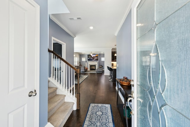 7403 Hemen Way, Fairview, TN 37062 - entryway with stairs, visible vents, crown molding, and wood finished floors