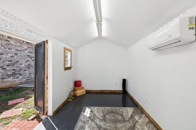 7403 Hemen Way, Fairview, TN 37062 - basement with baseboards, a wall mounted AC, and brick wall