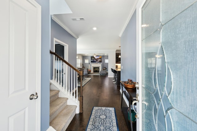 7403 Hemen Way, Fairview, TN 37062 - entrance foyer with visible vents, crown molding, stairs, and wood finished floors
