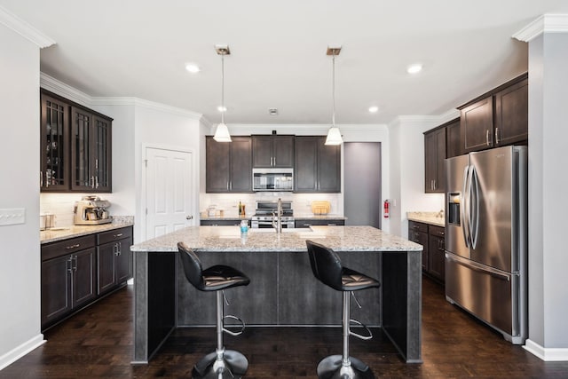 7403 Hemen Way, Fairview, TN 37062 - kitchen with a sink, dark wood-style flooring, appliances with stainless steel finishes, and dark brown cabinets