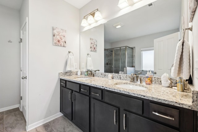 7403 Hemen Way, Fairview, TN 37062 - full bathroom featuring double vanity, a sink, baseboards, and a shower stall
