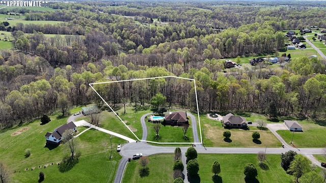 bird's eye view featuring a view of trees