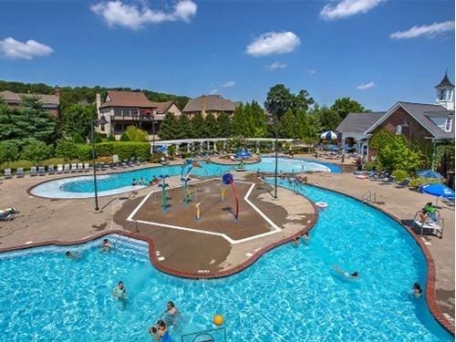 community pool featuring a patio area
