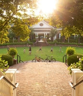 view of home's community featuring a lawn