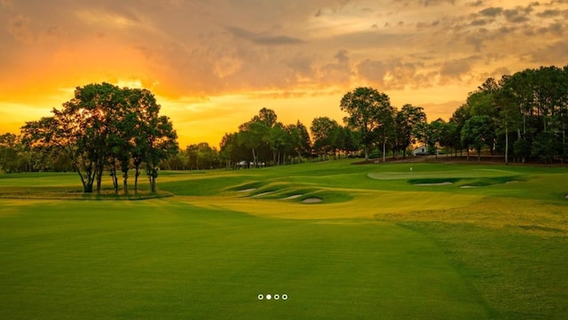 view of community featuring view of golf course