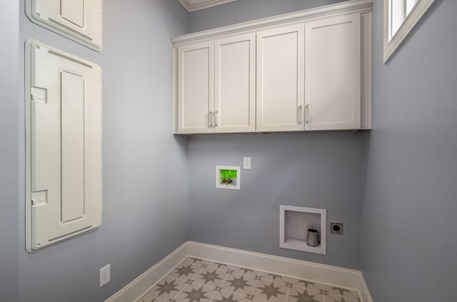 clothes washing area with light floors, hookup for an electric dryer, baseboards, cabinet space, and washer hookup