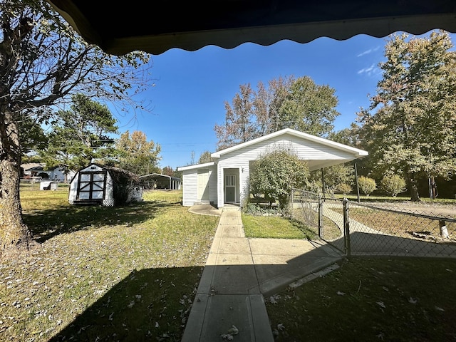 273 Chapel Rd, New Johnsonville, TN 37134 - exterior space with an outbuilding, fence, a front yard, and a shed