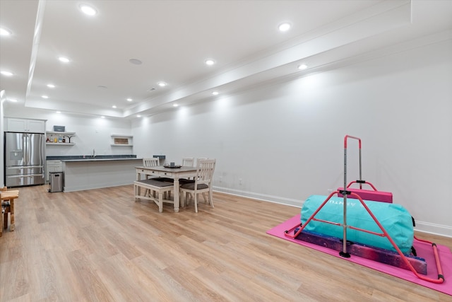1428 Boardwalk Pl, Gallatin, TN 37066 - playroom with a raised ceiling, recessed lighting, baseboards, and light wood-type flooring