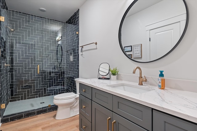 1428 Boardwalk Pl, Gallatin, TN 37066 - full bath with a stall shower, toilet, wood finished floors, and vanity