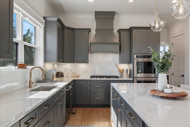 1428 Boardwalk Pl, Gallatin, TN 37066 - kitchen with a sink, appliances with stainless steel finishes, custom exhaust hood, and crown molding