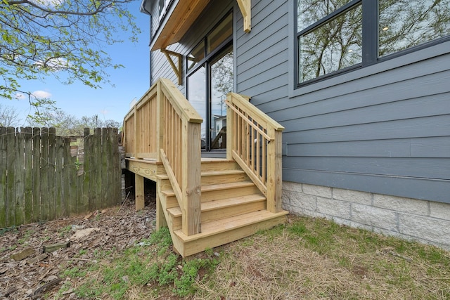 wooden deck featuring fence
