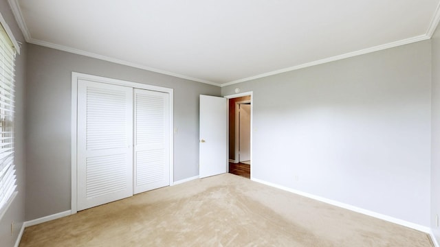 411 Whaley St, Smithville, TN 37166 - unfurnished bedroom with light colored carpet, a closet, baseboards, and crown molding