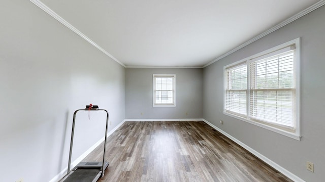 411 Whaley St, Smithville, TN 37166 - unfurnished room with wood finished floors, baseboards, and crown molding