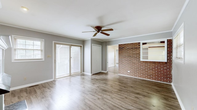 411 Whaley St, Smithville, TN 37166 - unfurnished room featuring a ceiling fan, wood finished floors, baseboards, and crown molding