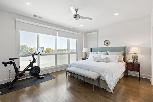 bedroom with baseboards, visible vents, recessed lighting, and dark wood finished floors