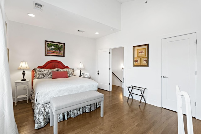 bedroom featuring visible vents, recessed lighting, and wood finished floors