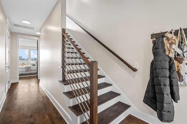 3118 Trevor St, Nashville, TN 37209 - stairway with wood finished floors, baseboards, and visible vents