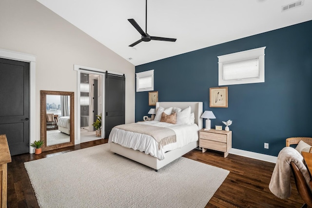 3118 Trevor St, Nashville, TN 37209 - bedroom with dark wood-type flooring, a ceiling fan, visible vents, a barn door, and baseboards
