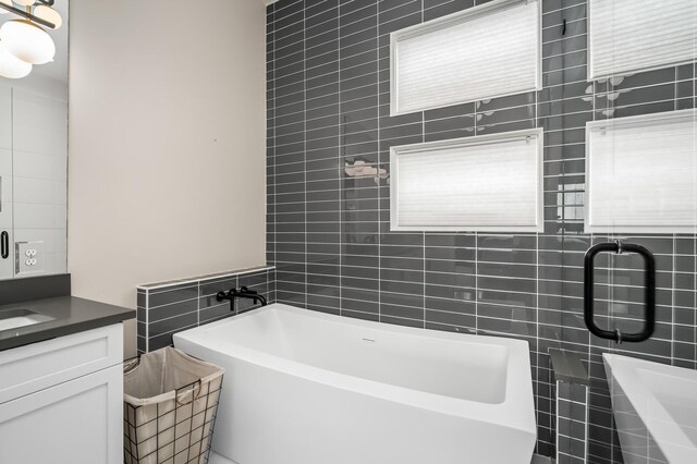 3118 Trevor St, Nashville, TN 37209 - full bath with vanity, a bath, and tile walls