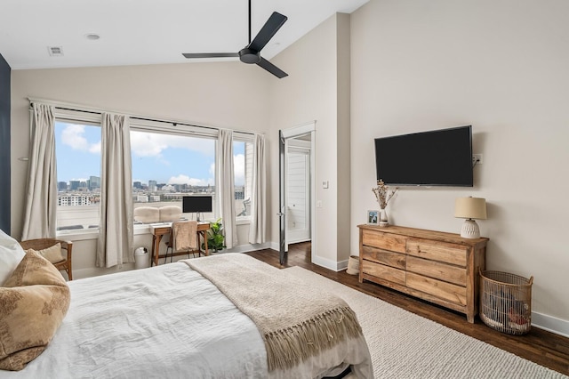 3118 Trevor St, Nashville, TN 37209 - bedroom with baseboards, a view of city, visible vents, high vaulted ceiling, and wood finished floors