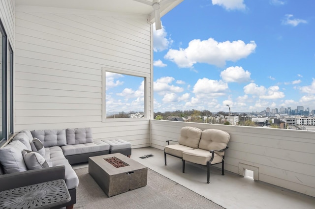3118 Trevor St, Nashville, TN 37209 - view of patio / terrace featuring an outdoor living space with a fire pit, a view of city, visible vents, and a balcony