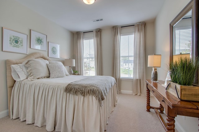 3021 Fanshaw Rd, Smyrna, TN 37167 - bedroom featuring light colored carpet, baseboards, multiple windows, and visible vents