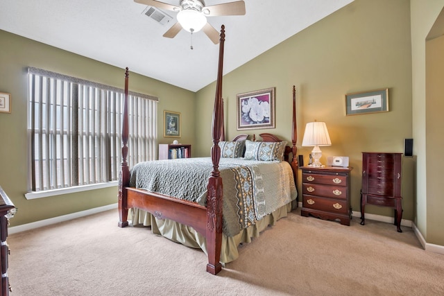 carpeted bedroom with visible vents, baseboards, ceiling fan, and lofted ceiling
