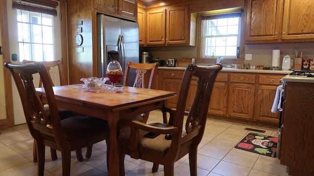kitchen with brown cabinets and appliances with stainless steel finishes