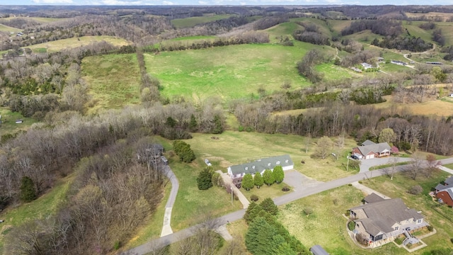birds eye view of property featuring a rural view
