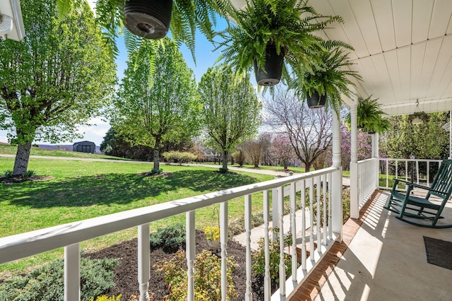 balcony featuring covered porch