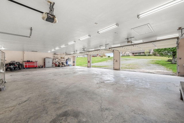garage featuring a garage door opener