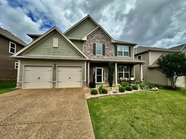 2006 Austin Dr, Spring Hill, TN 37174 - view of front of home featuring stone siding, a porch, a front lawn, concrete driveway, and an attached garage
