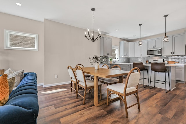 dining area featuring baseboards, recessed lighting, and dark wood-style flooring