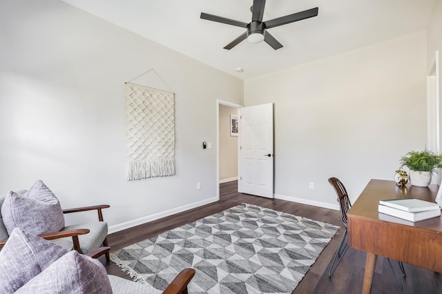home office featuring baseboards, wood finished floors, and a ceiling fan