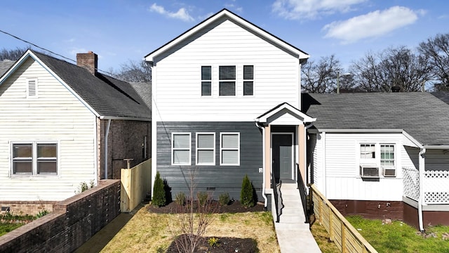 view of front of house featuring crawl space and cooling unit