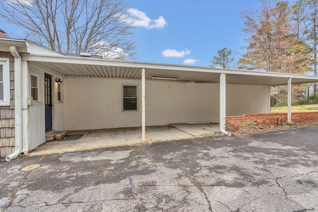 view of parking with a carport