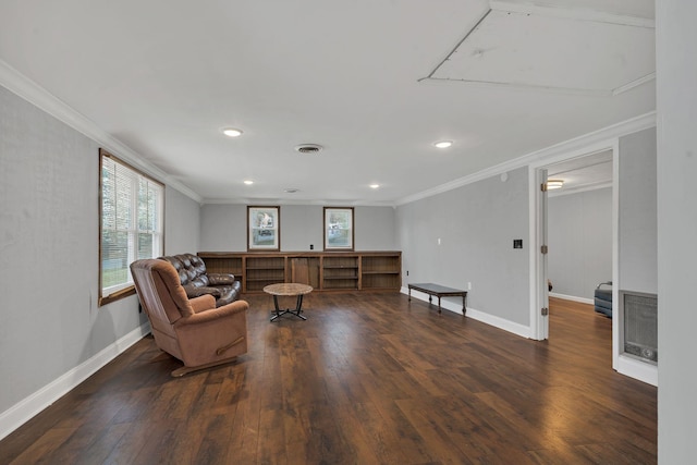 sitting room with recessed lighting, ornamental molding, baseboards, visible vents, and wood finished floors