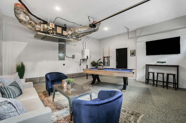 rec room with water heater, speckled floor, baseboards, and pool table