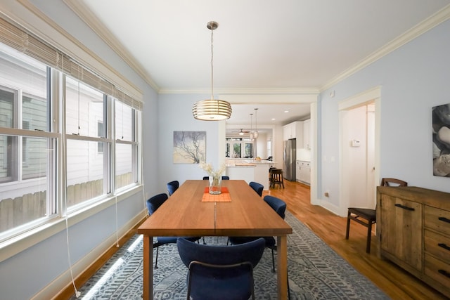 5311 Tennessee Ave Unit A, Nashville, TN 37209 - dining room with baseboards, wood finished floors, and ornamental molding