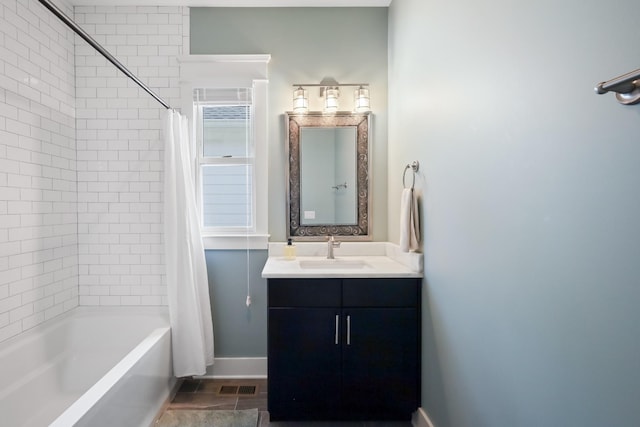 5311 Tennessee Ave Unit A, Nashville, TN 37209 - full bathroom featuring baseboards, shower / tub combo, visible vents, and vanity