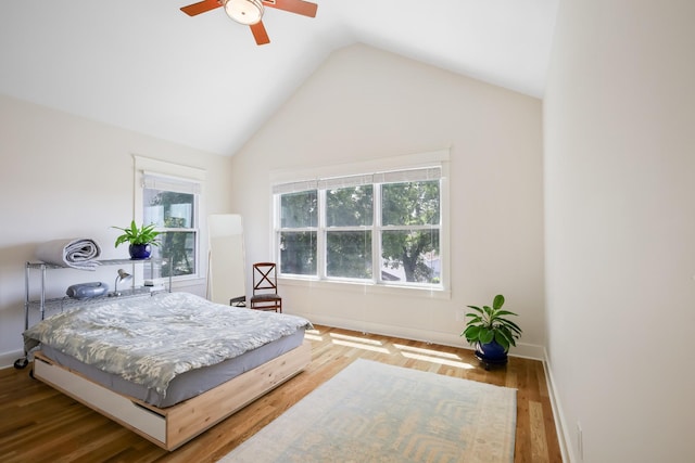 5311 Tennessee Ave Unit A, Nashville, TN 37209 - bedroom featuring baseboards, wood finished floors, vaulted ceiling, and multiple windows
