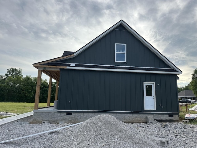 0 Evans Rd, Winchester, TN 37398 - view of side of property with crawl space and board and batten siding