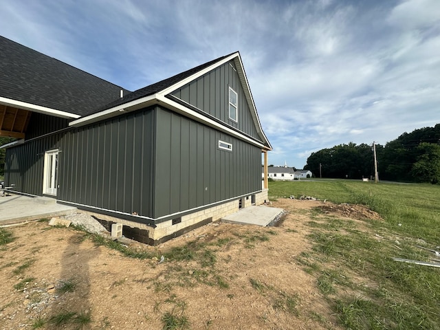 0 Evans Rd, Winchester, TN 37398 - view of home's exterior with board and batten siding and a lawn